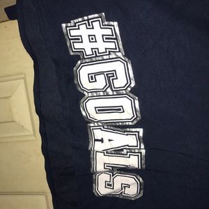 long sleeve shirt “#goals”